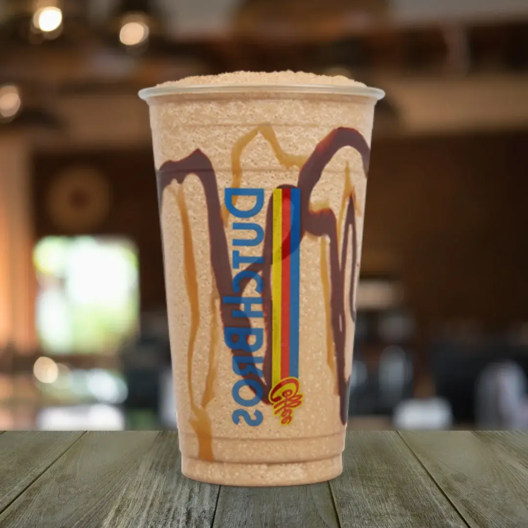A Picture Perfect Dutch Bros on a wooden table.
