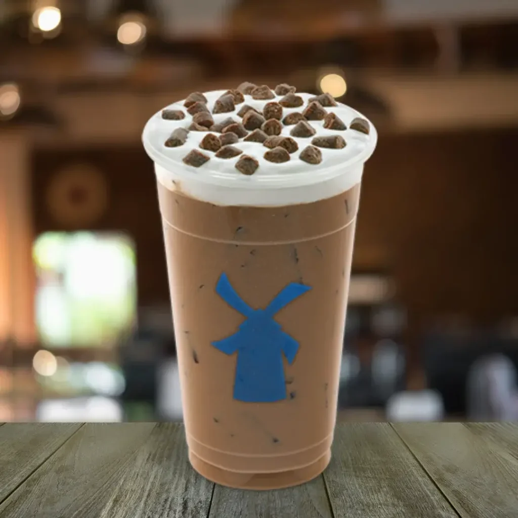Dutch Bros Iced Coffee Caffeine Chart: 4 A Brownie Batter Mocha dutch bros drink on a wooden table.